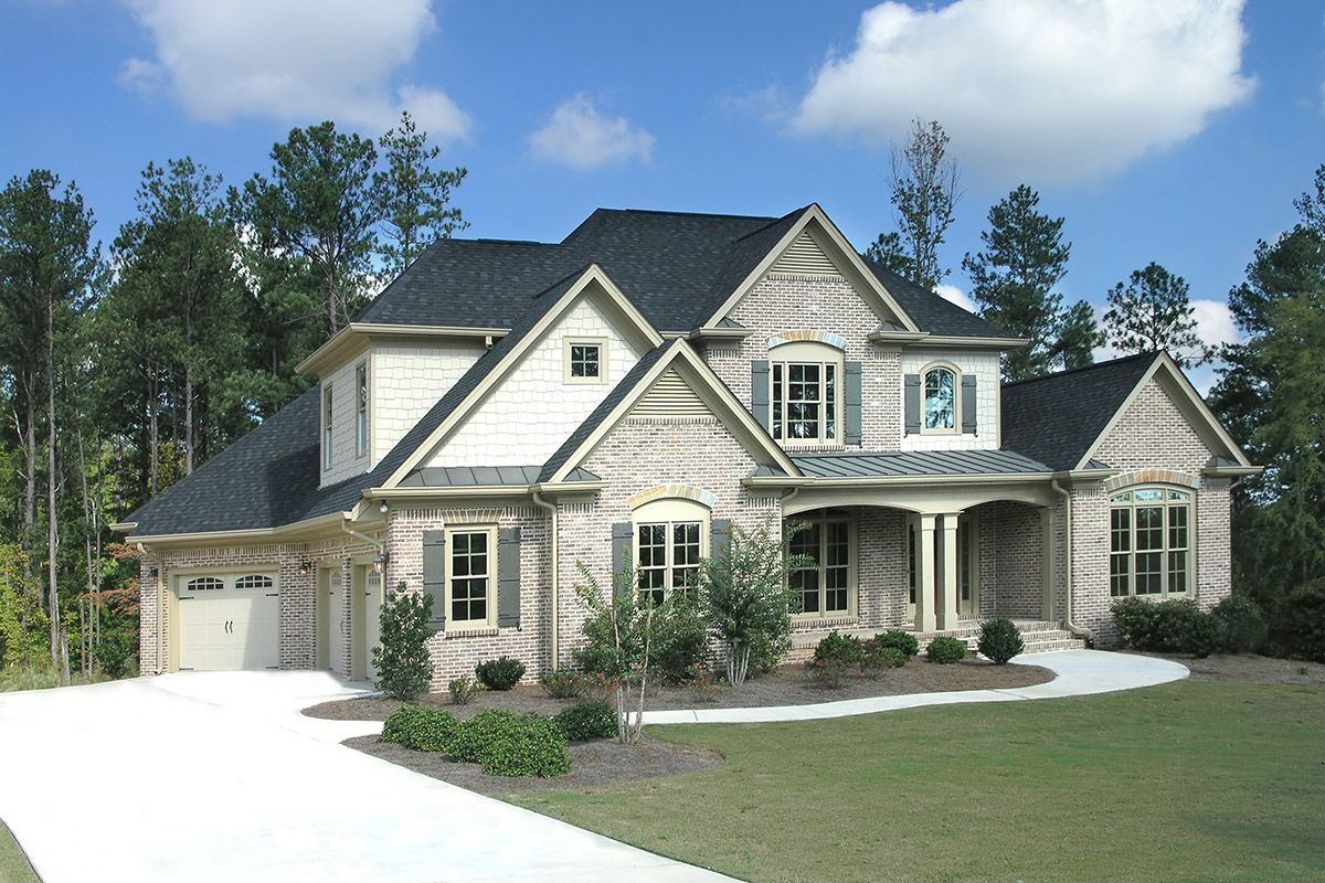 The home design architects are reviewing the house plan draft, t